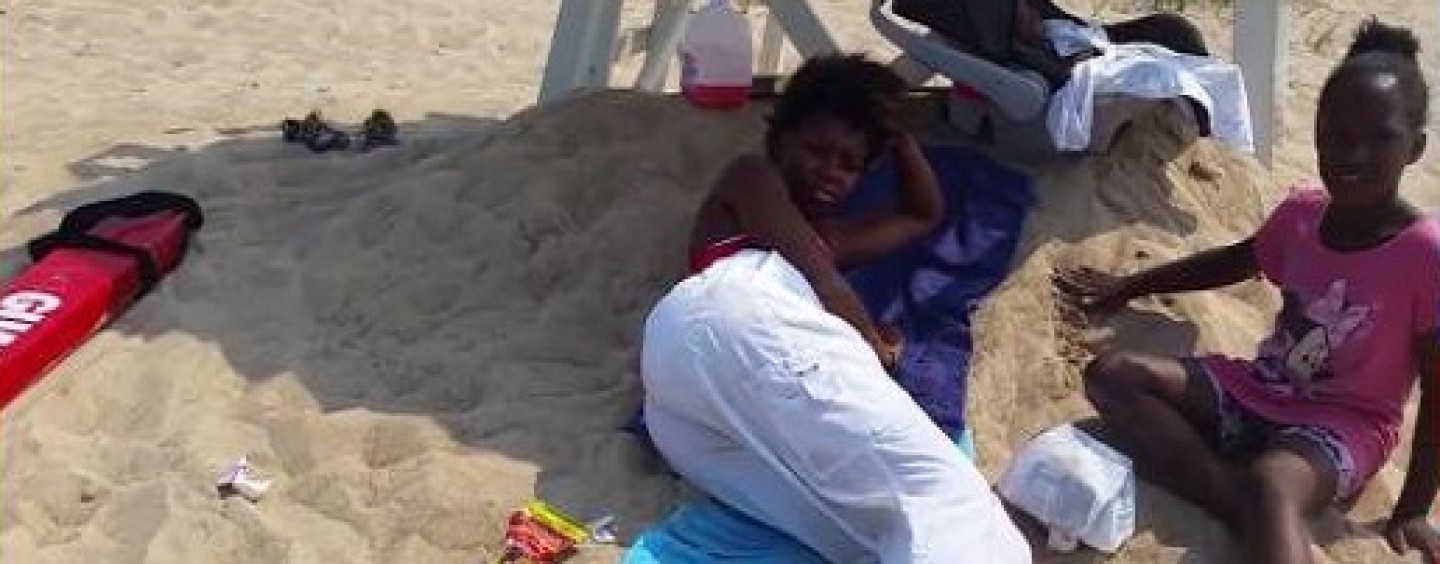 Man Records Black Life Guard Sleeping On Duty With Her Two Bastard Kids In Tow! (Video)