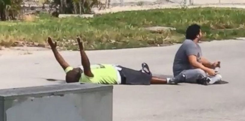 Black Man Shot By The White Cop While Laying Down With His Hands UP!  (Video)