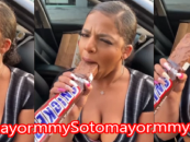 Look At What This Woman Decided To Do To This King Size Snickers Bar With Her Mouth! (Video)