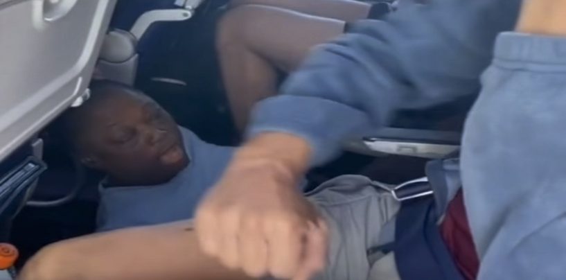 Black Woman Spits On White Passengers Before And As She Is Being Forcibly Removed From Airplane! (Video)