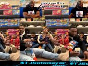 Idiot Black Father Eats Snacks Off The Floor Of A Grocery Store With His Baby Mom & Children! (Video)
